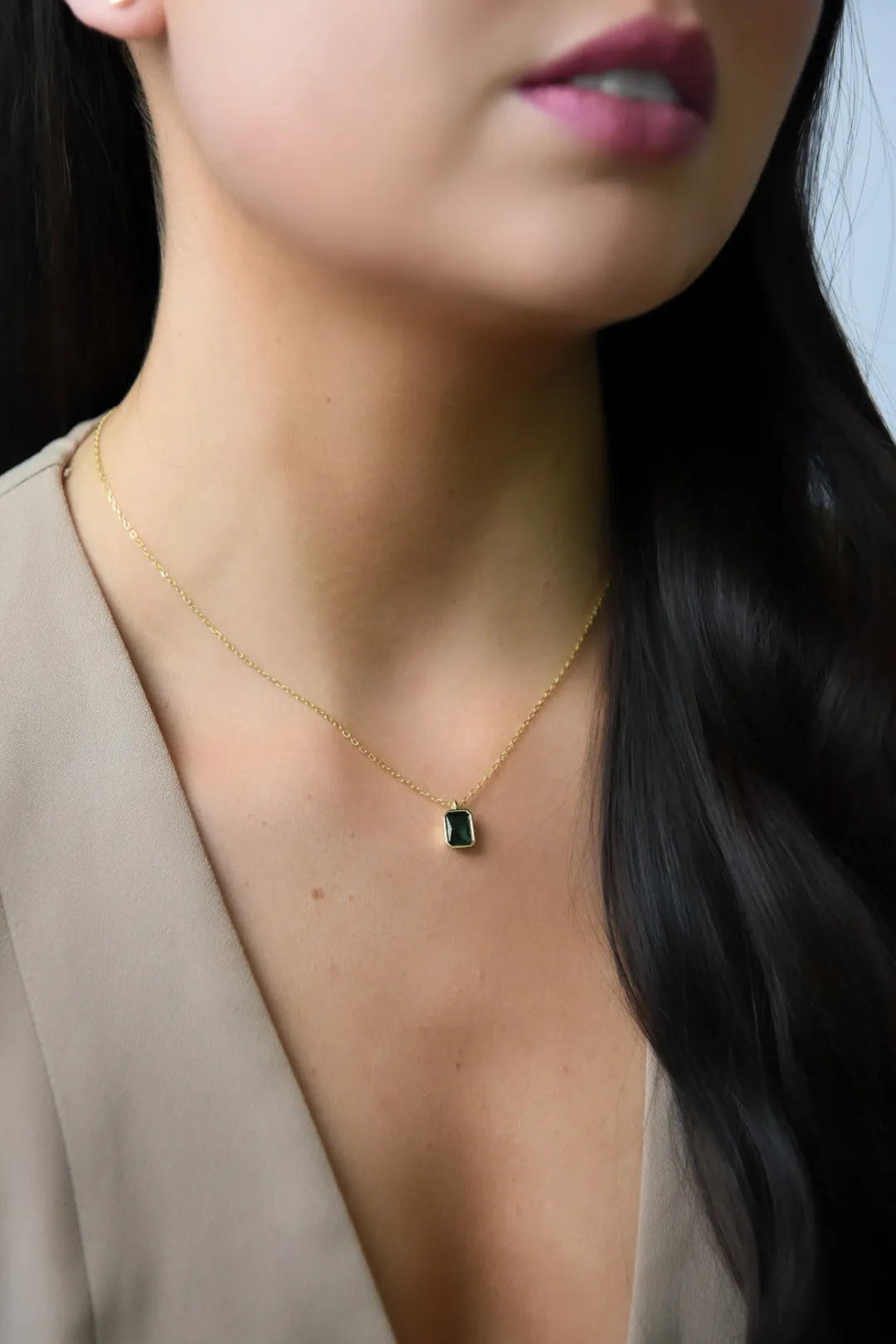 Golden Bezel Set Emerald Cz Pendant