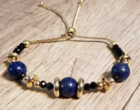 Hand Crafted Lapis Lazuli on 14k Yellow Gold Ion Plated Stainless Steel Bolo Style Bracelet, Adjustable.