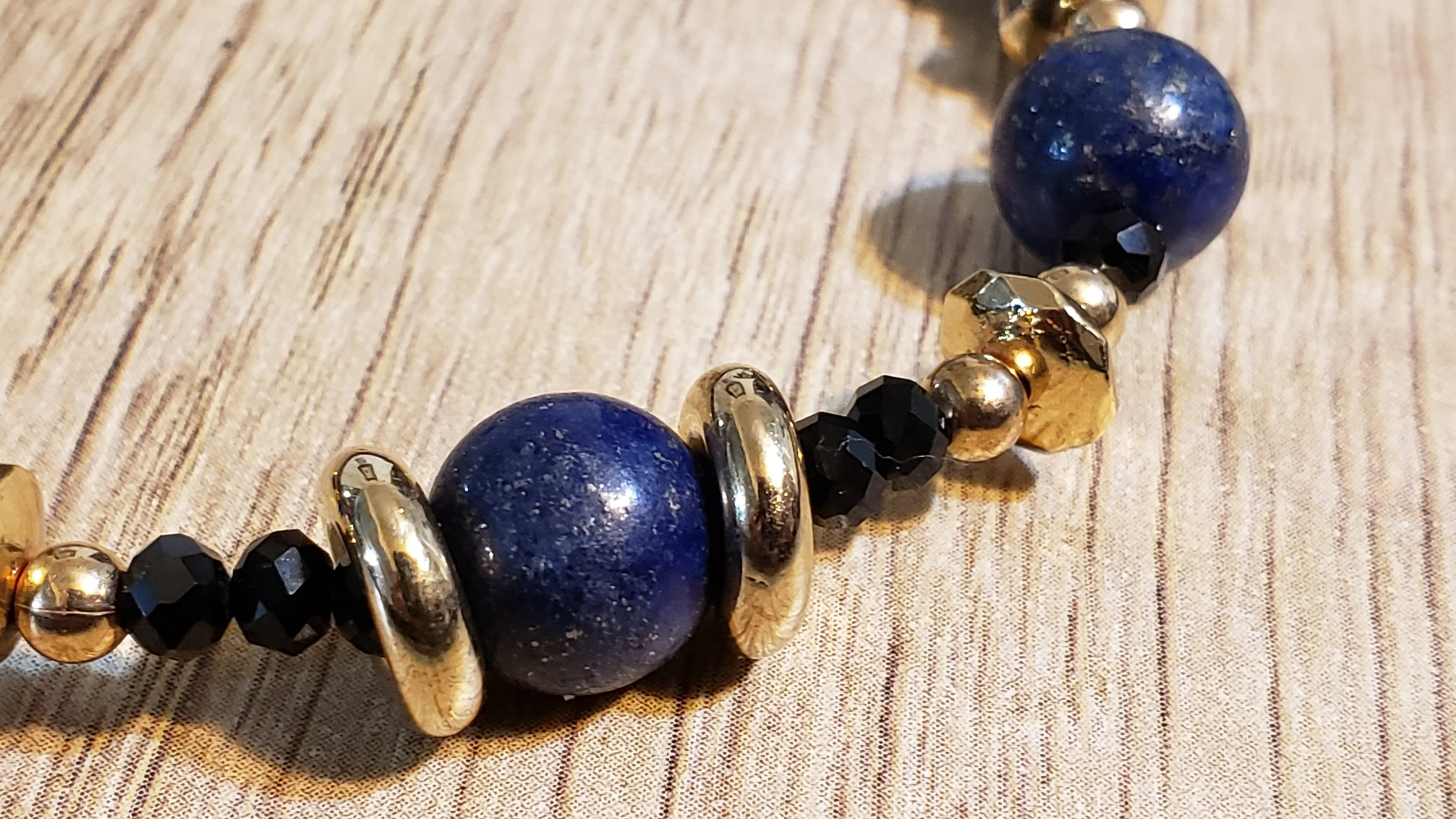 Hand Crafted Lapis Lazuli on 14k Yellow Gold Ion Plated Stainless Steel Bolo Style Bracelet, Adjustable.