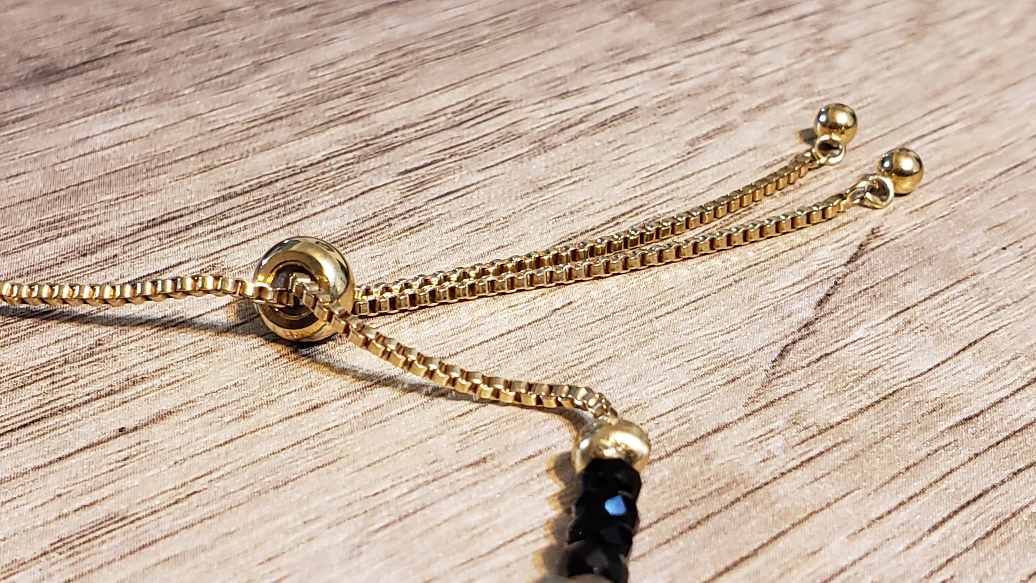 Hand Crafted Lapis Lazuli on 14k Yellow Gold Ion Plated Stainless Steel Bolo Style Bracelet, Adjustable.