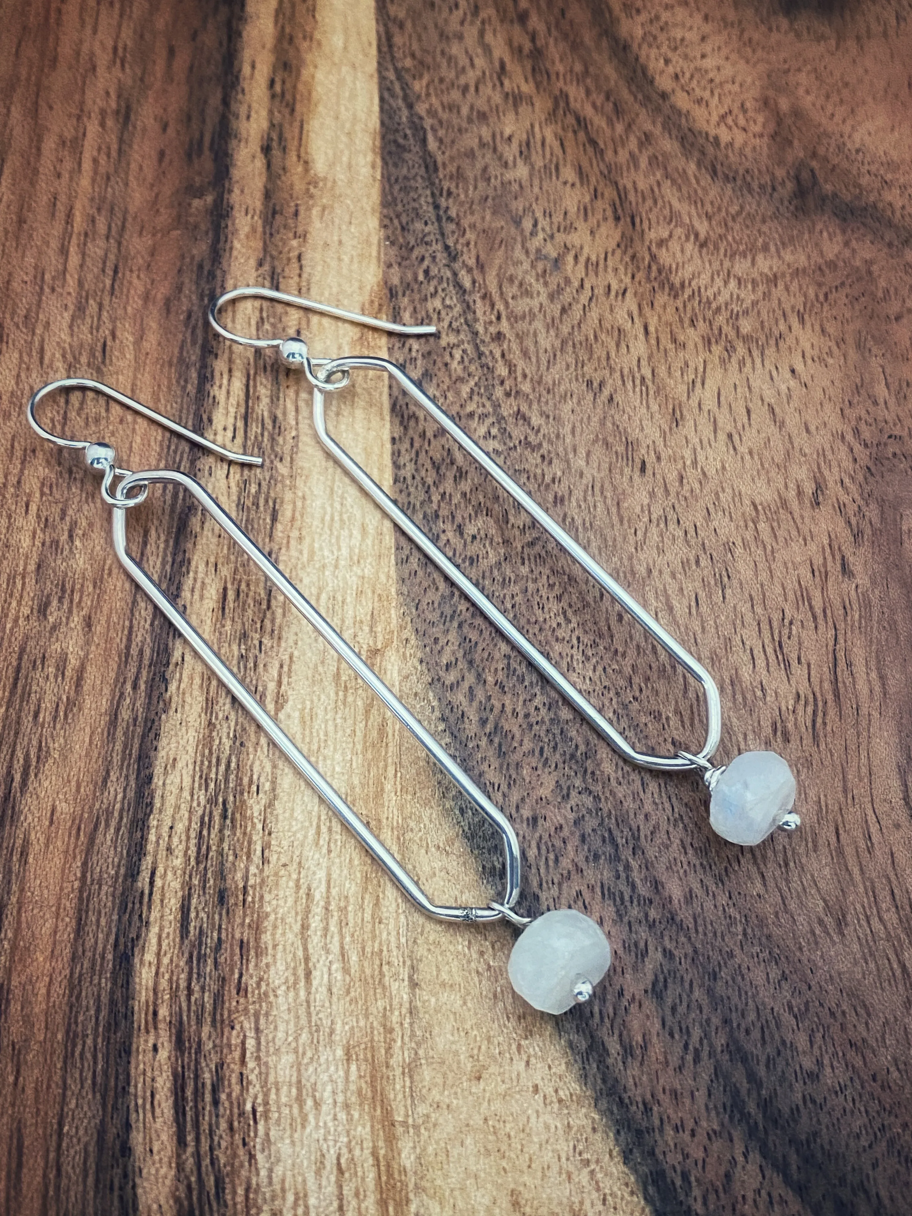 Sterling silver pointed oval hoops with moonstone